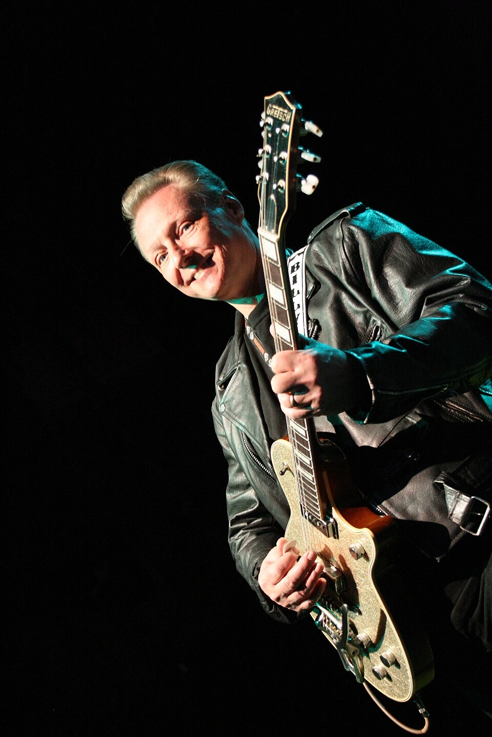 Billy Zoom playing guitar on stage